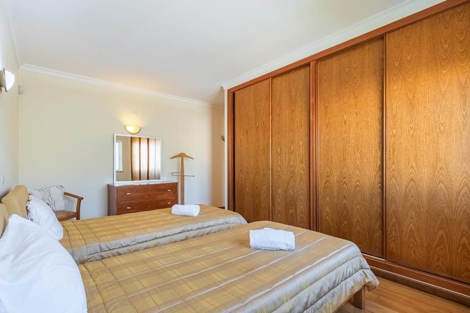 Twin bedroom with en suite bathroom and A/C