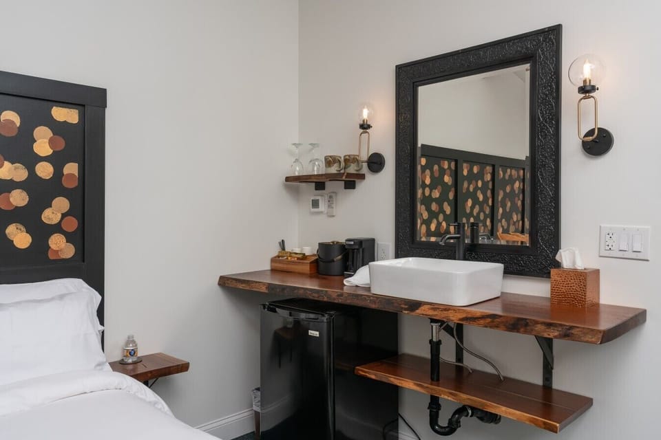 kitchenette area/outer vanity, with dimmable lighting