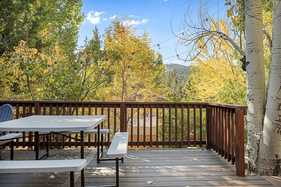 Step onto the deck and enjoy dining outdoors, surrounded by the beauty of nature.