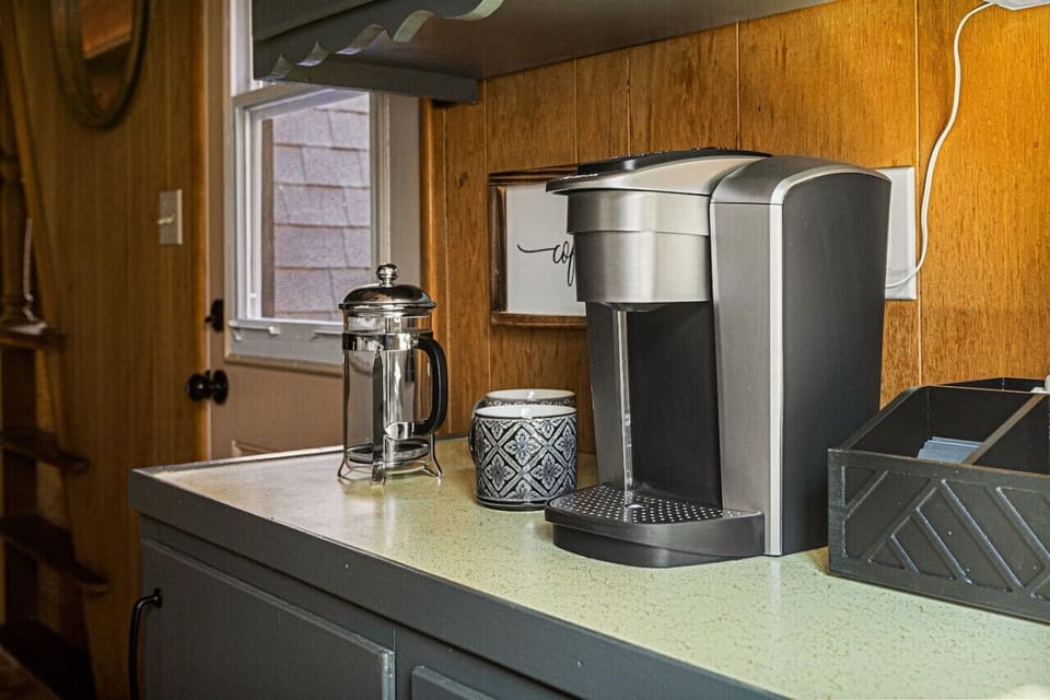 Fully equipped kitchen features a Keurig coffee maker and French press for all your coffee needs.