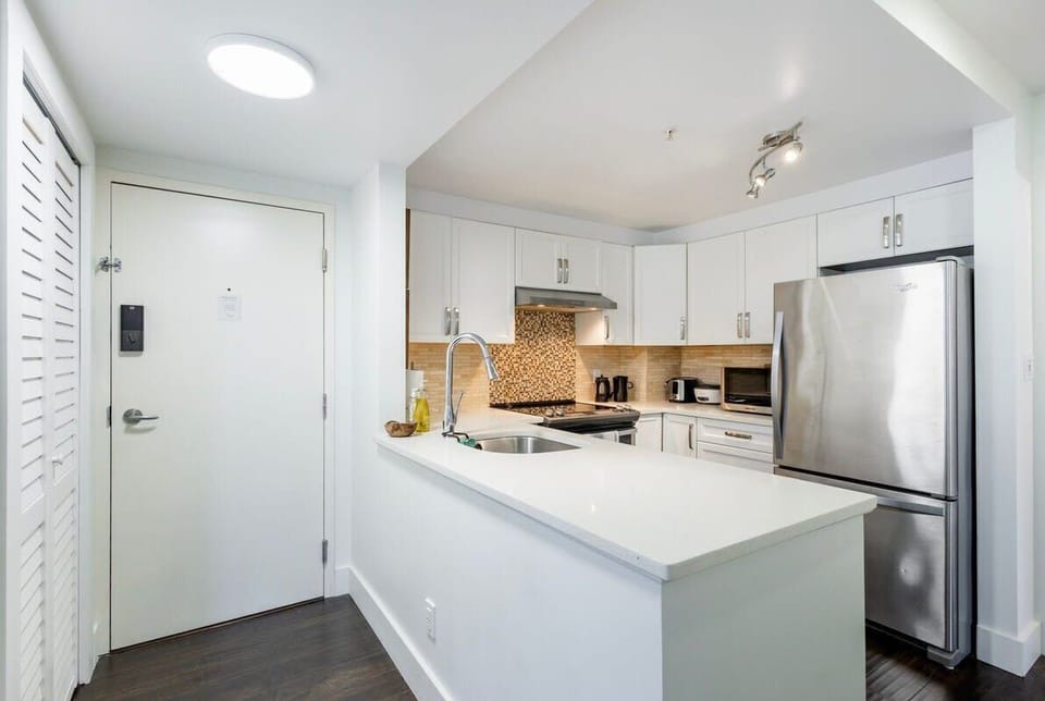 The kitchen greets you as soon as you step inside.
