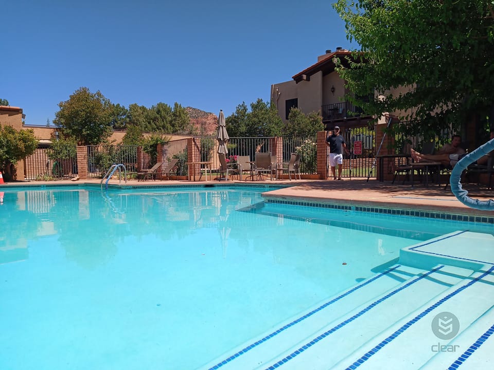 8 foot deep pool, brand new resurfacing,  that's the condo above! year round 