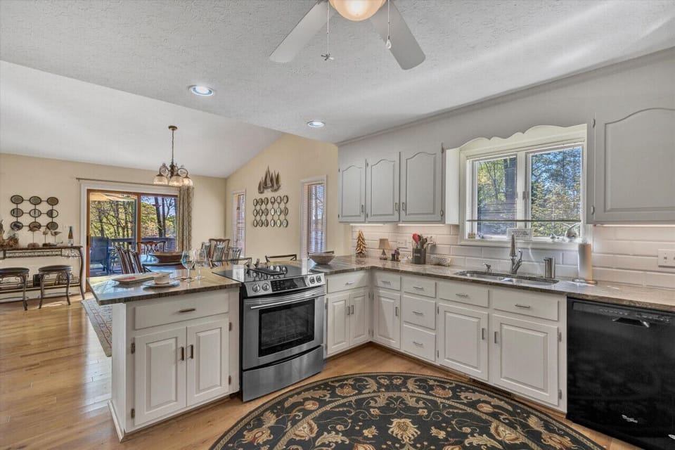 Sleek kitchen design with all the utensils you need for home-cooked meals.