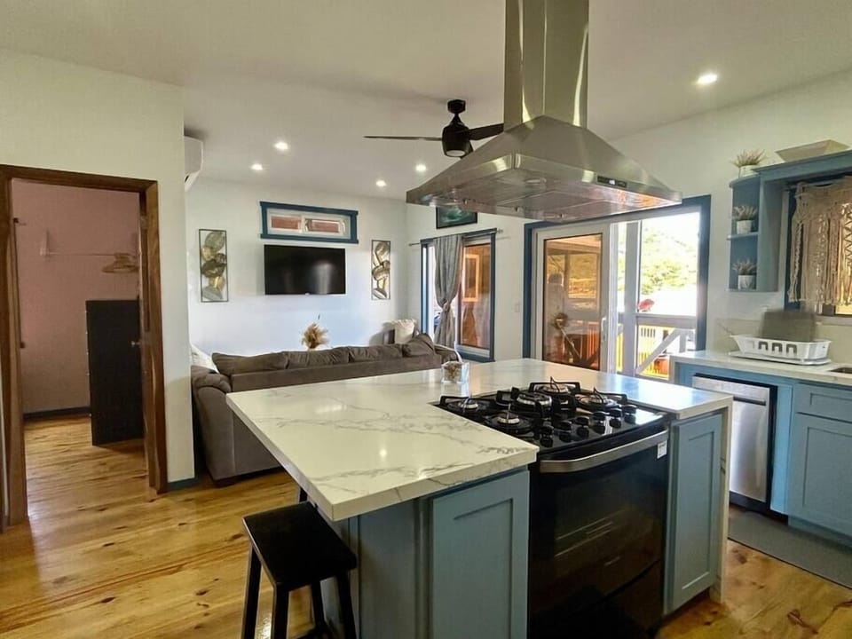 Open kitchen living room with slider to deck