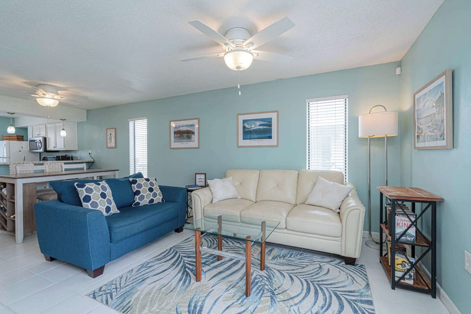 Curl up in the coastal living room & stream all your favorite entertainment