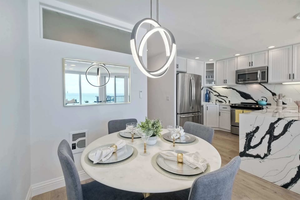 Gather for elegant meals together at the dining table, with seating for 4