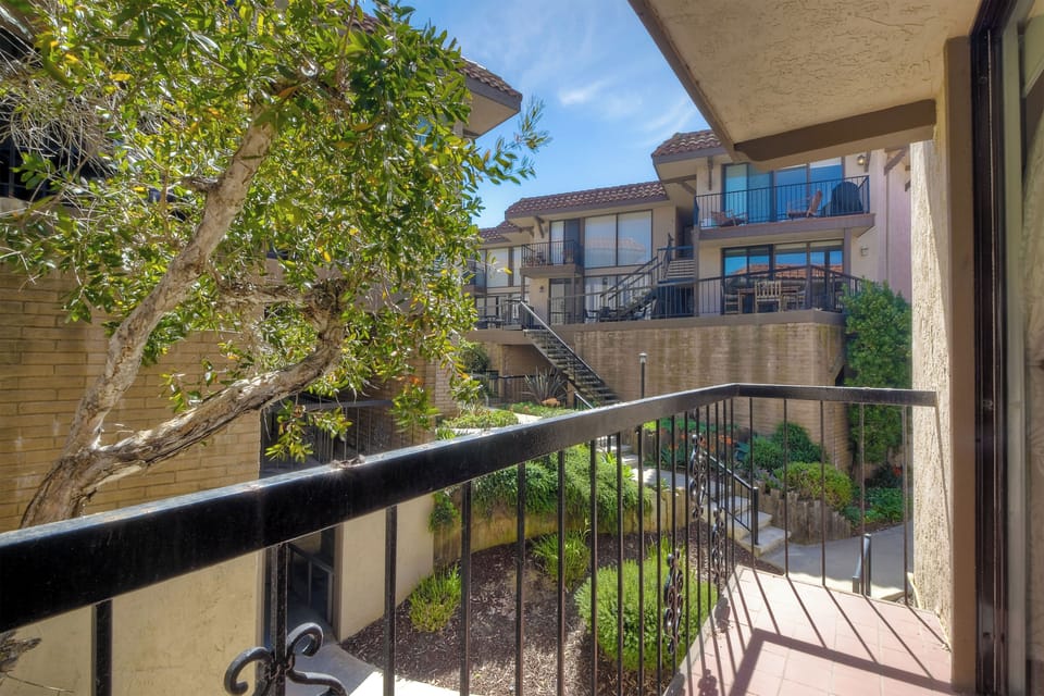 The sophisticated king suite boasts a private ensuite, balcony, & Smart TV