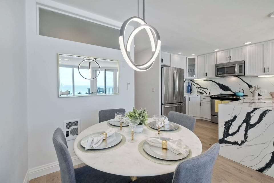 Gather for elegant meals together at the dining table, with seating for 4