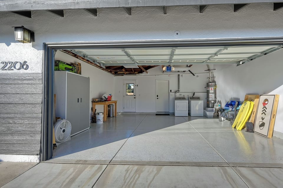 The garage offers parking spaces for 2 vehicles & loads of amenities