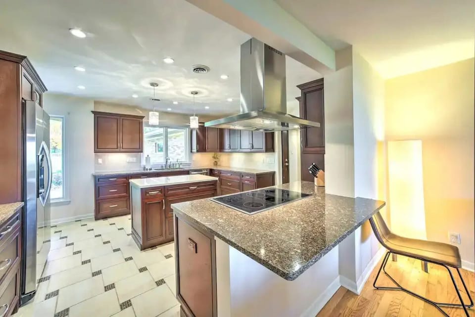 Wide open kitchen with lots of light and a view to the lake while you cook.