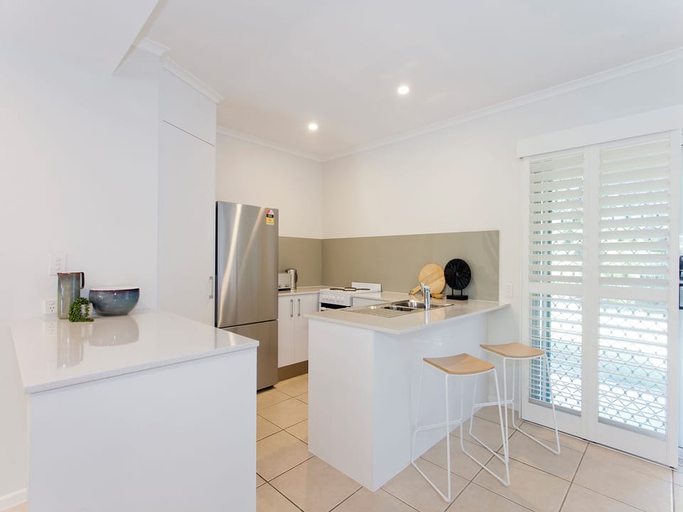 Townhome, Patio, Garden View | Private kitchen | Electric kettle, toaster