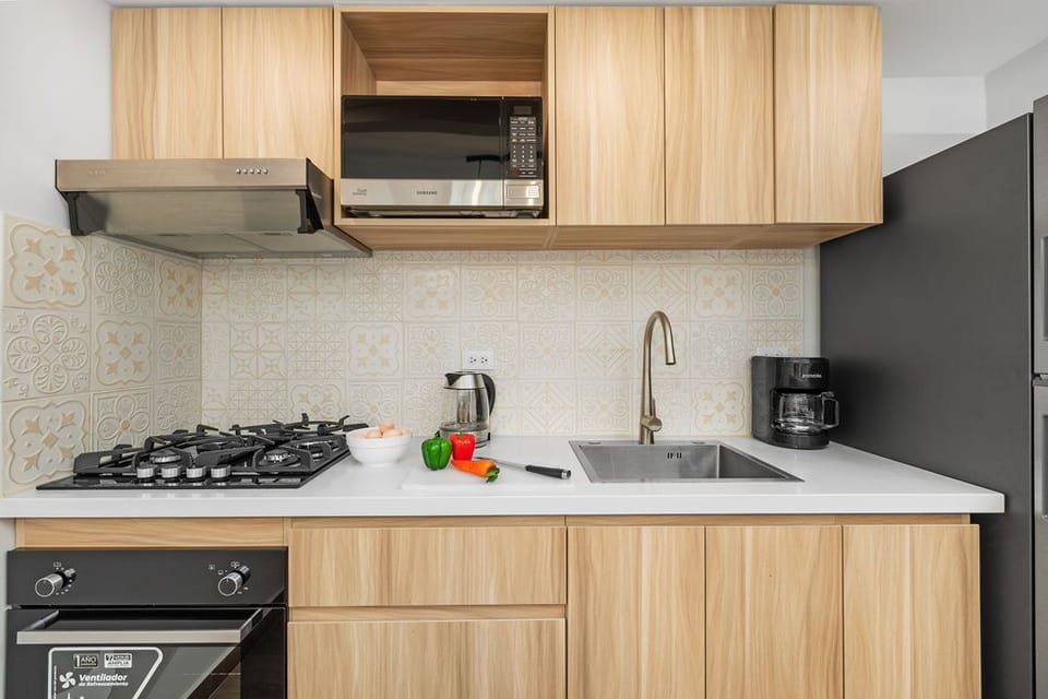 With modern appliances and plenty of counter space, you'll feel right at home whipping up your favorite dishes. Enjoy family meals or cozy breakfasts in style.