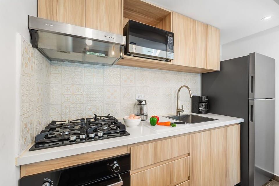 With modern appliances and plenty of counter space, you'll feel right at home whipping up your favorite dishes. Enjoy family meals or cozy breakfasts in style.