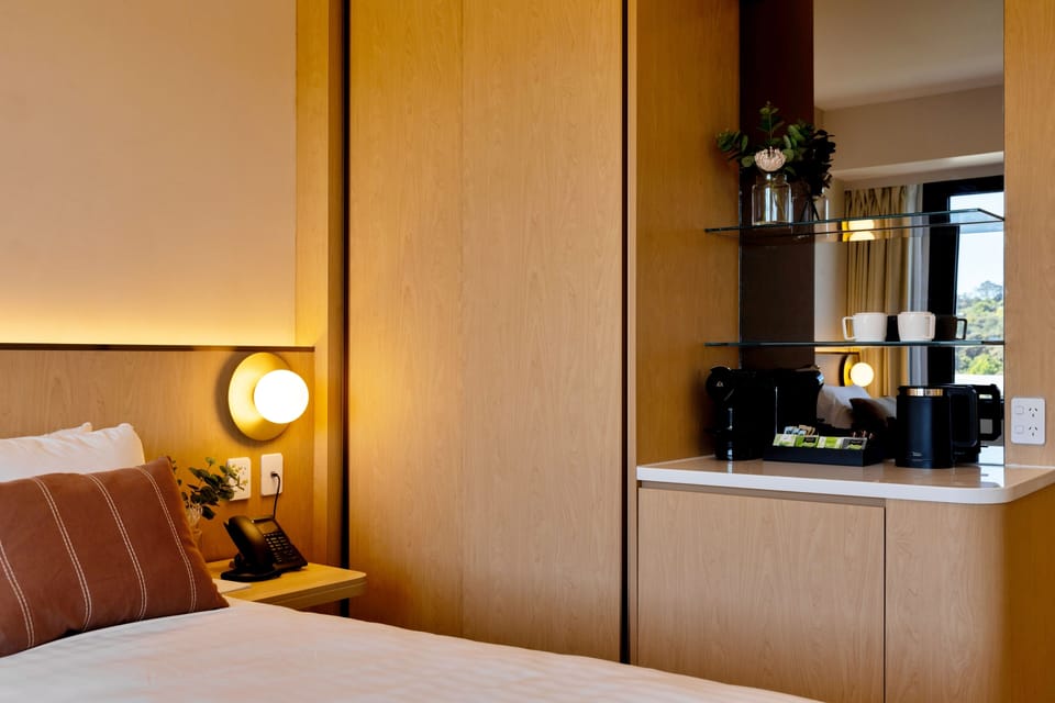 Premium bedding, in-room safe, blackout drapes, soundproofing