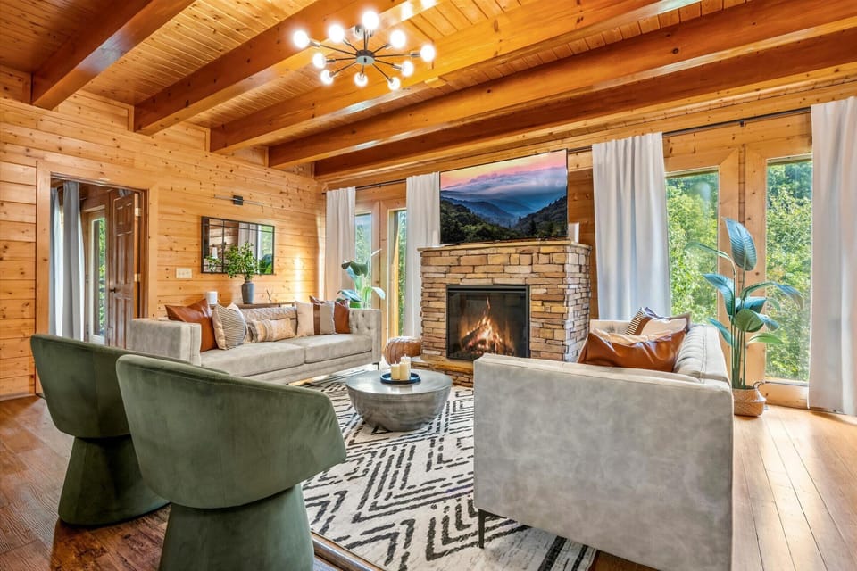 Cozy mountain retreat with plush sofas and warm fireplace !