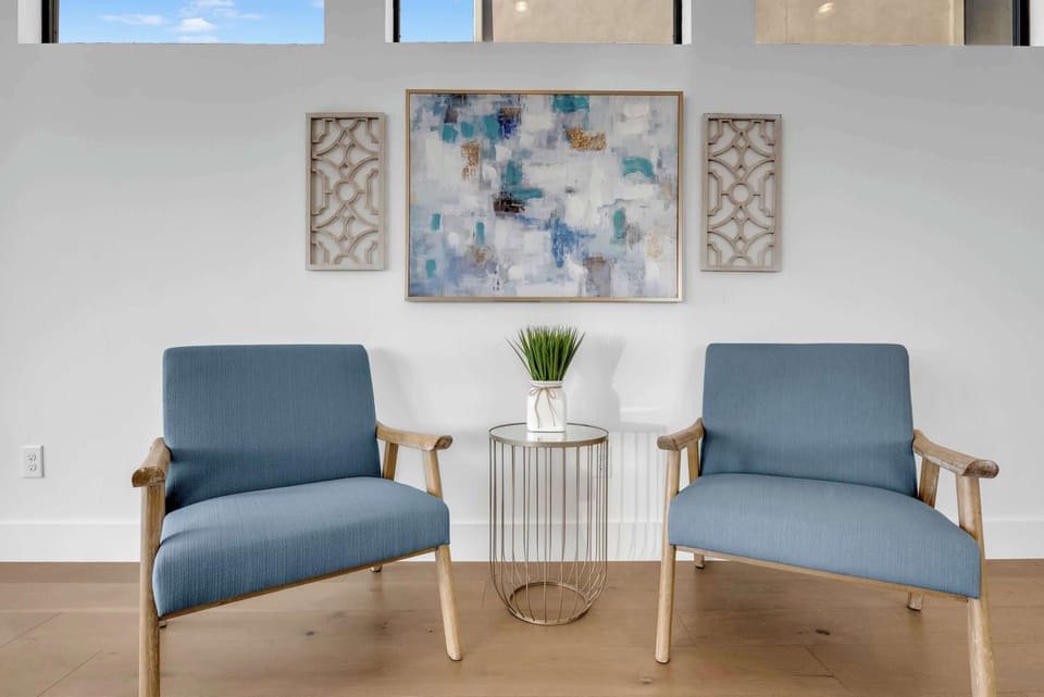 Have your morning coffee in these chairs behind the living room