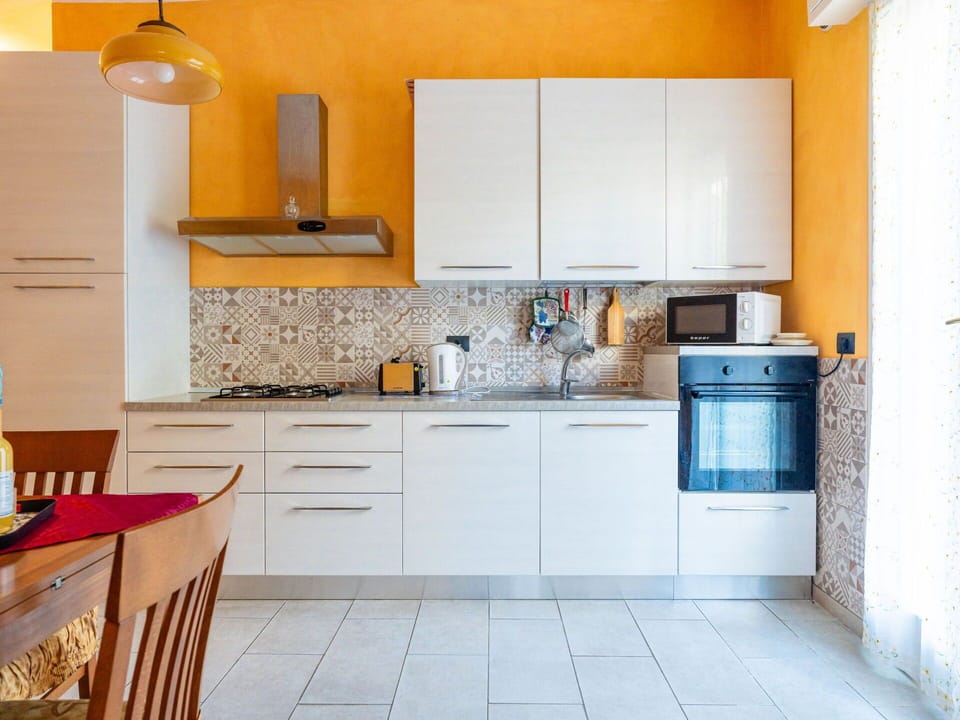 Cabinetry, Kitchen Sink, Countertop, Property, Sink, Kitchen Appliance, Kitchen, Kitchen Stove, Home Appliance, Lighting