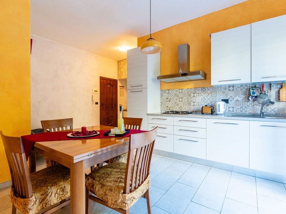 Cabinetry, Furniture, Countertop, Property, Sink, Table, Wood, Tap, Interior Design, Chair