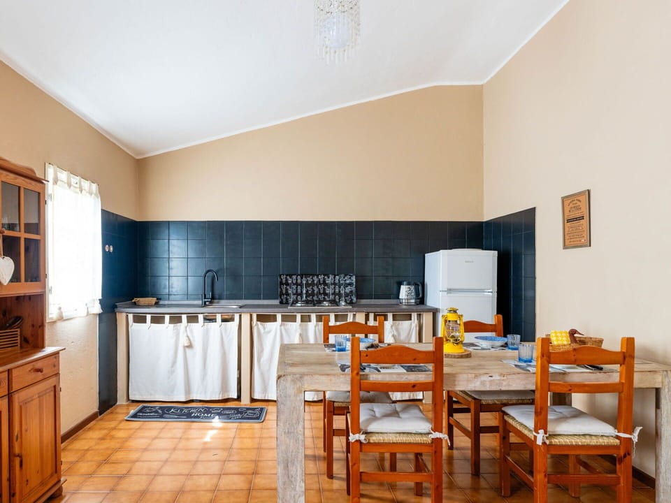 Cabinetry, Furniture, Table, Wood, Countertop, Interior Design, Flooring, Floor, Shelving, Chair