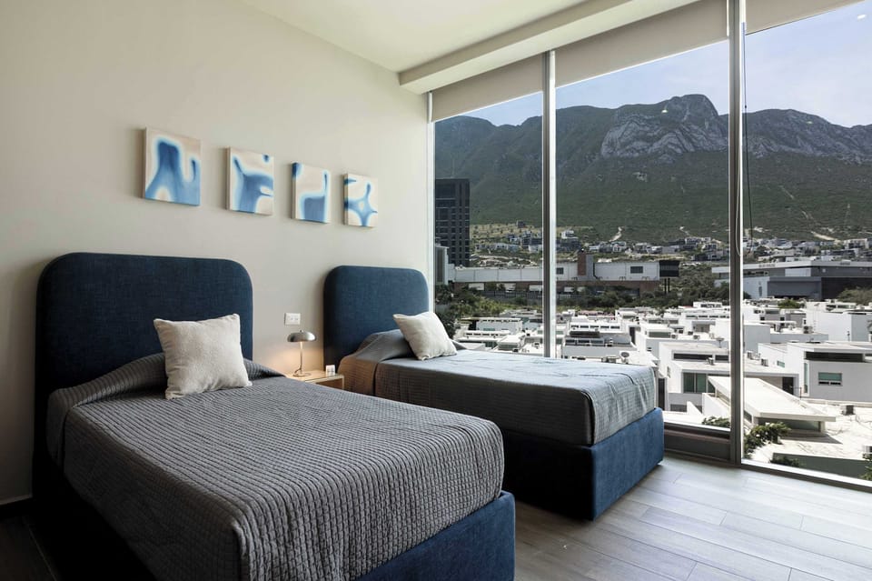 Perfect for sharing, Bedroom 3 offers two comfortable single beds.