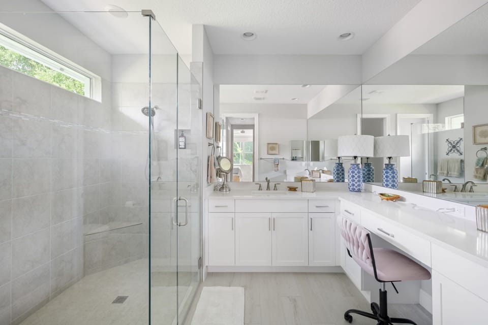 Master ensuite, has plenty of natural light and lots of space for multiple people to get ready for a great dinner out after a long day at the beach.