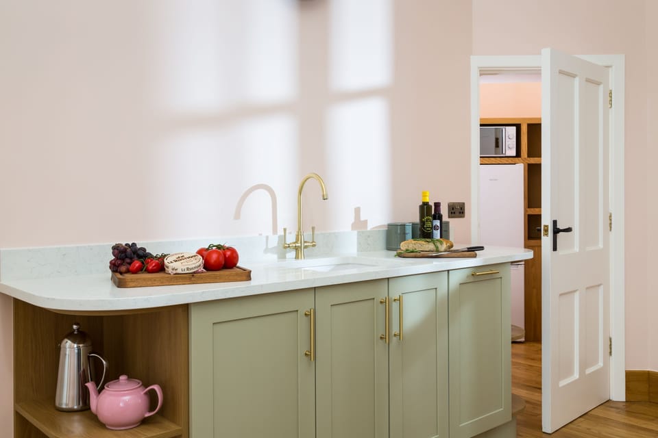 Kitchen leading through to the larder in the small turret