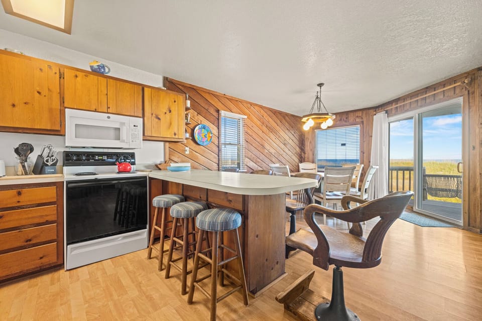 Kitchen with Bar Stool Seating on Second Level with Ocean Views