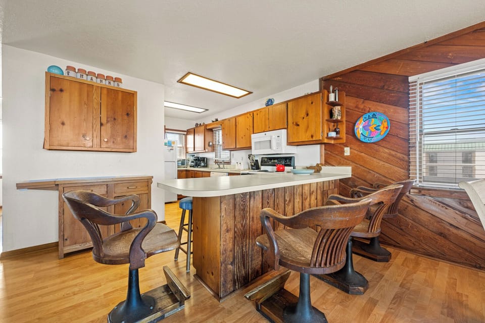 Kitchen with Bar Stool Seating on Second Level with Ocean Views