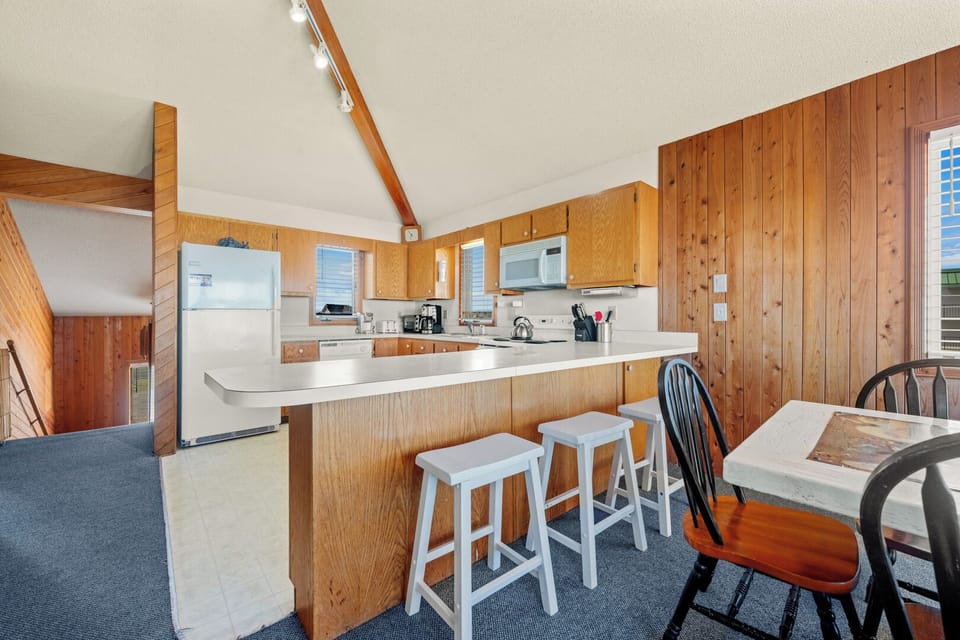 Kitchen with Bar Stool Seating on Third Level with Ocean Views