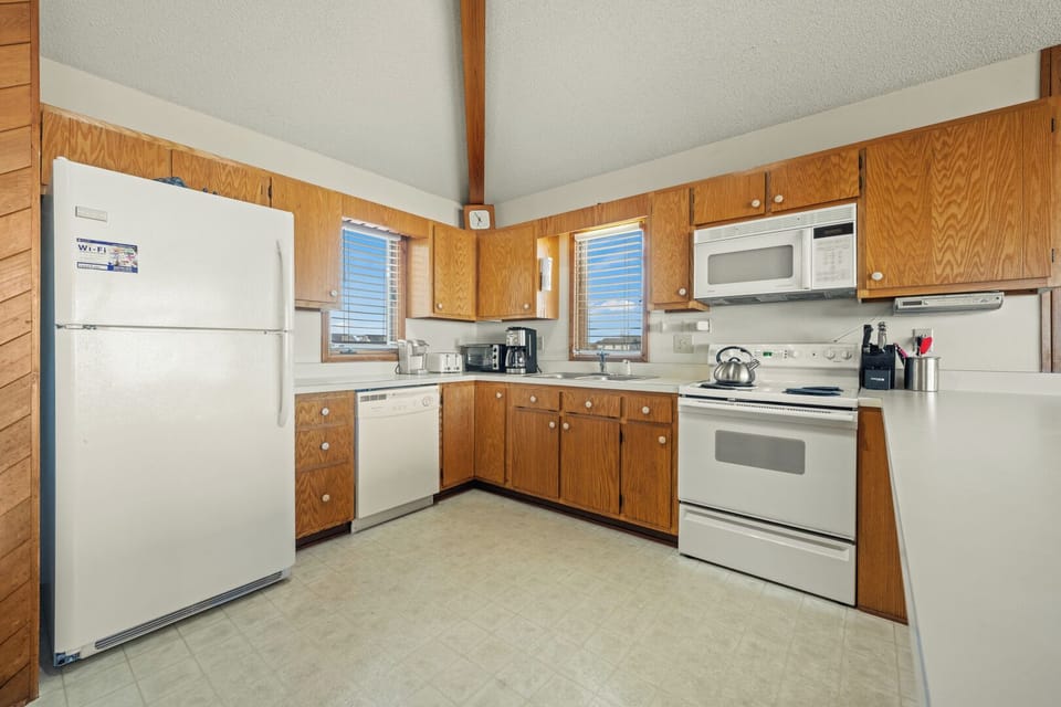Kitchen with Bar Stool Seating on Third Level with Ocean Views