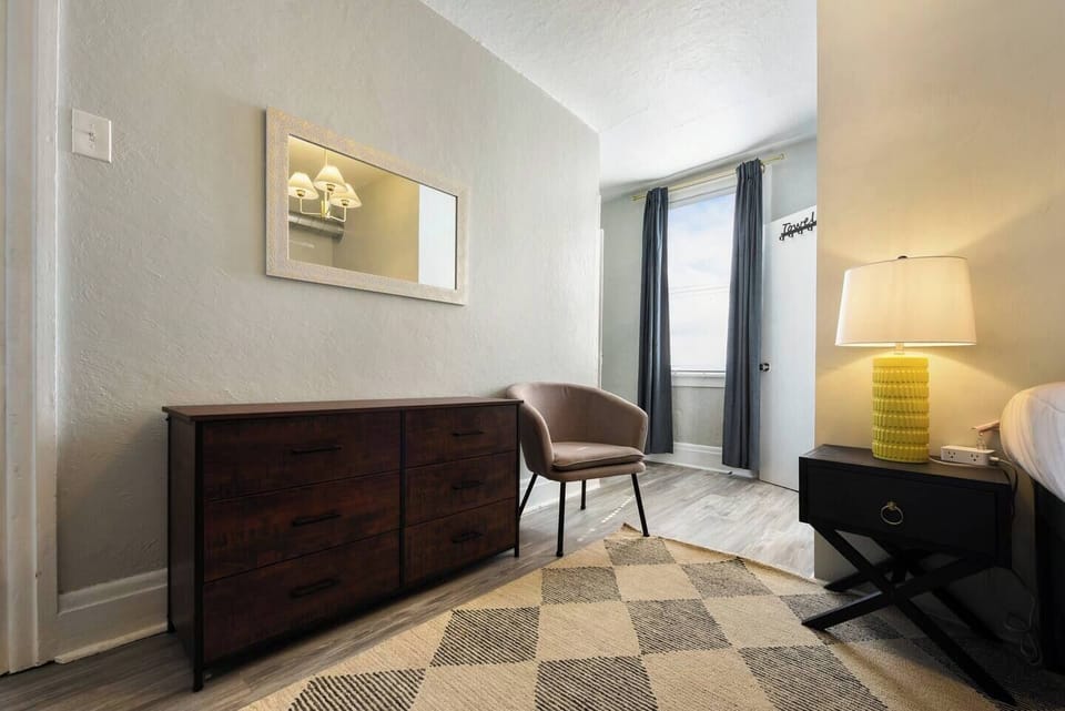 Bedroom 3 offers 2 single beds and a work desk