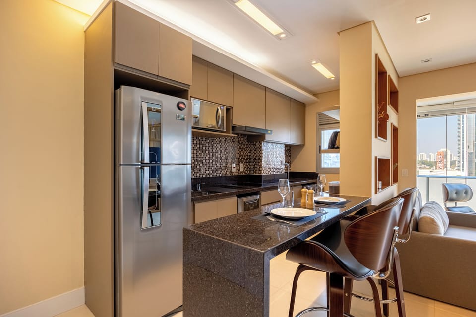 Deluxe Apartment, Balcony, City View | Private kitchen | Microwave, stovetop, cookware/dishes/utensils