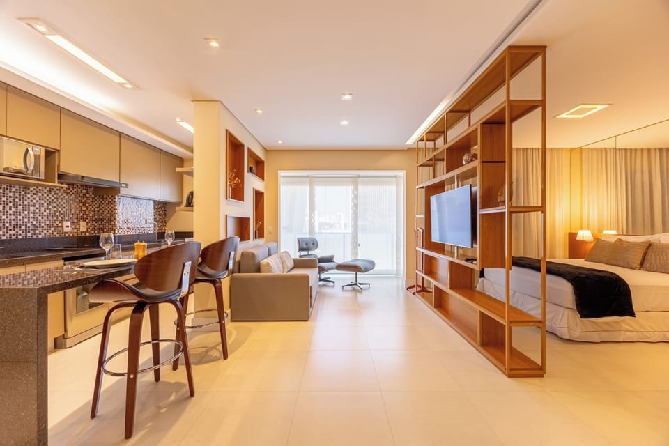 Deluxe Apartment, Balcony, City View | Living area | TV