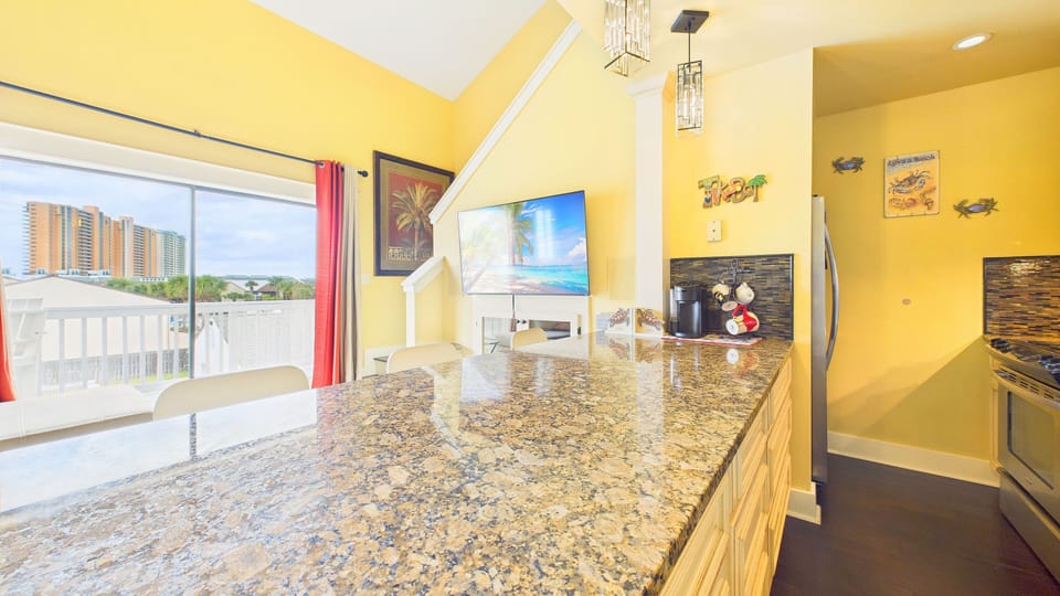 Huge kitchen counter with breakfast bar seating