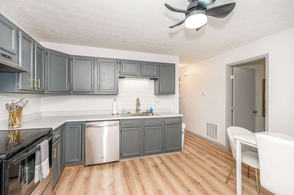 The elegant kitchen offers ample space & all the comforts of home