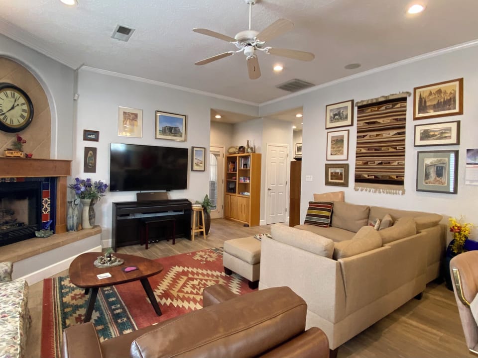 65 in. Smart with Roku TV and piano.