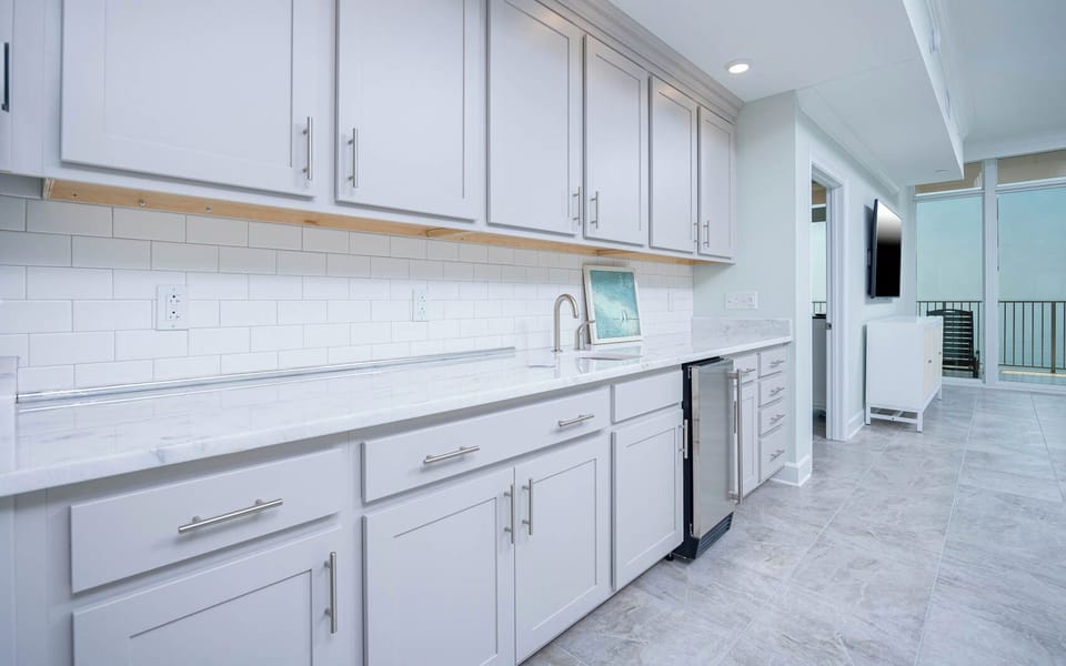 Grab a chilled drink from the fridge or create your favorite cocktail at the wet bar