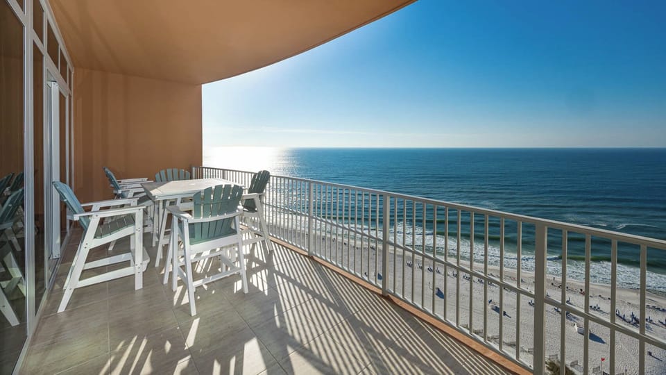 Relax on balcony chairs and listen to gulf surf while watching the beachfront horizon shimmer