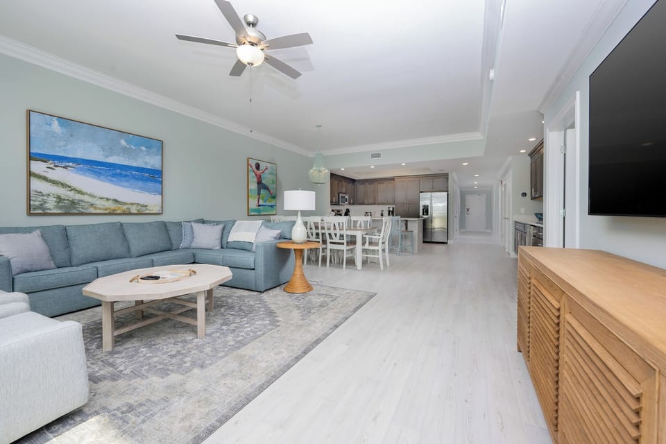 Unwind after a day at the beach and stream your favorite shows with coastal decor in this inviting family room