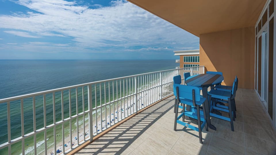 Watch the coastline stretch into the distance and the horizon meet the sky from your balcony and soak up the sun