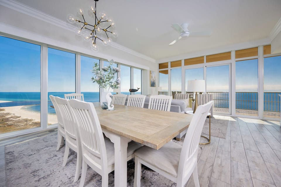 Gather around the dining table, soaking in panoramic views while enjoying the coastal breeze