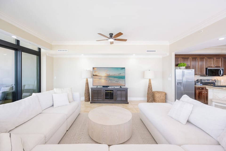 The spacious, inviting living room offers comfort and style for the whole family