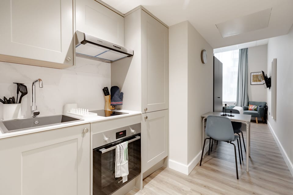 Deluxe Studio, Ensuite, City View | Shared kitchen | Full-size fridge, microwave, highchair, cookware/dishes/utensils