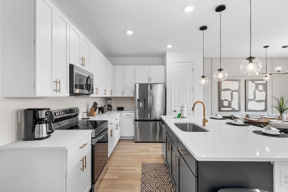 Full kitchen with stainless steel appliances