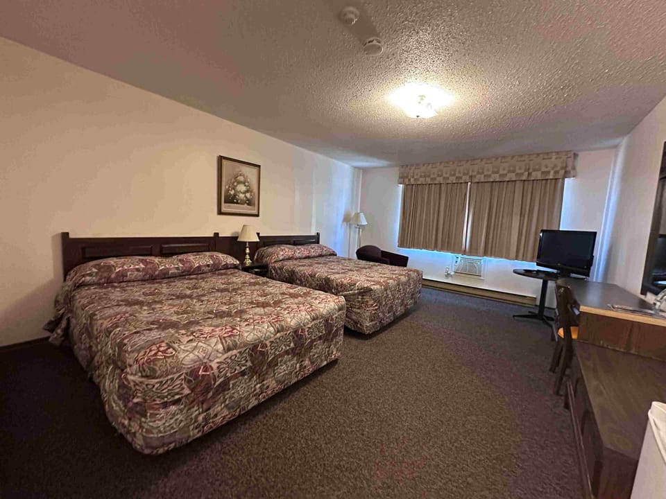 Economy Double Room, 2 Queen Beds | Individually furnished, desk, laptop workspace, iron/ironing board