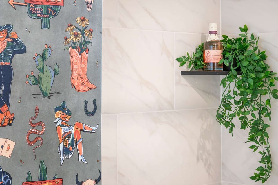 This fun & funky western wallpaper will greet you in the bathroom!
