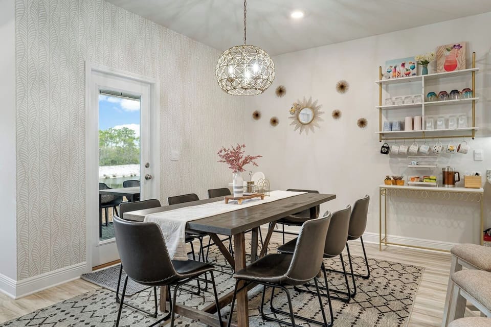The dining space, open to the kitchen and living, is perfect for family meals or game night!