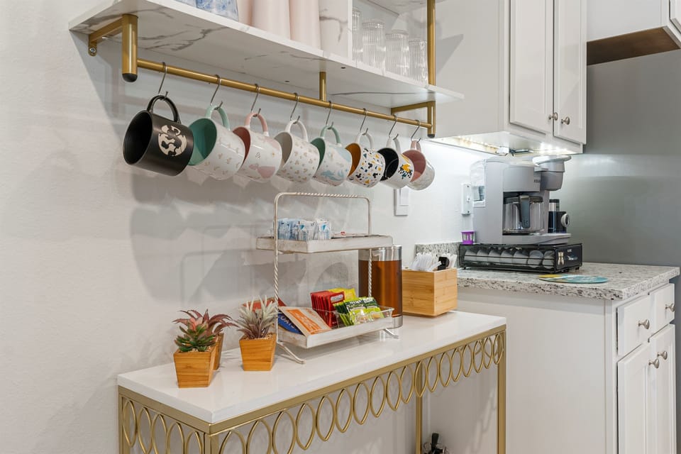 The coffee bar is stocked with tea, K-cups, and coffee grounds to get you started!
