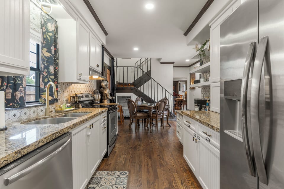 Cook, deal, and dine - full kitchen with poker/game table fun! Under stairs play kitchen. 