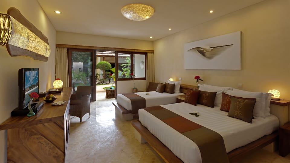 Suar Family Room  | Minibar, in-room safe, desk, blackout drapes